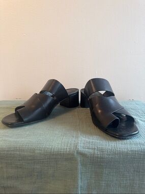 Via Spiga, women’s black leather strapped 2” heel open toe slides. Size 9